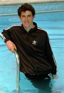 Swimming Training in Tracksuit